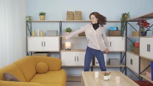 Woman Dancing and Relaxing at Home