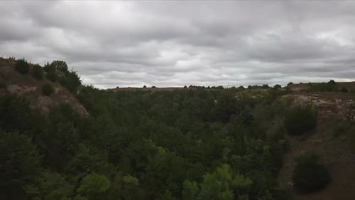Drone shot view of tiny hill. Deforestation of jungle video. dry season.
