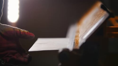 Industrial Concept A Worker Making Details Cutting a Metal Plate