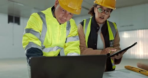 Engineering manager, team planning and laptop at construction site, blueprint design