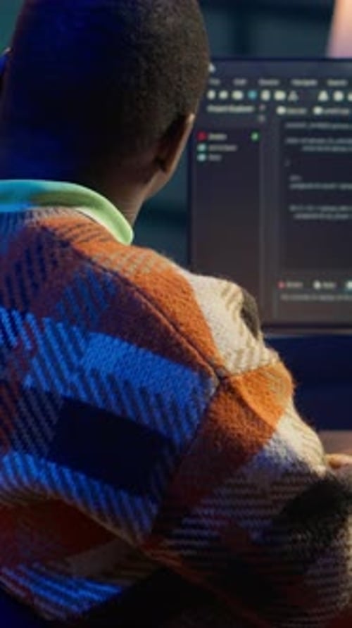 Vertical Video Black Software Engineer Writes Complex Binary Code Scripts on Computer