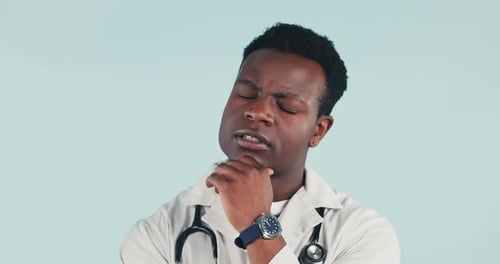 Thoughtful Doctor Considers a Medical Question