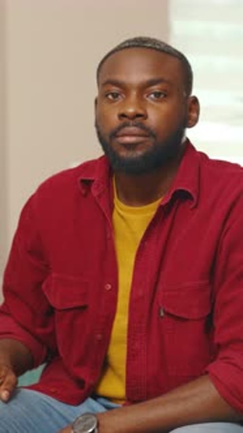 Young Man Posing Indoors for Portrait