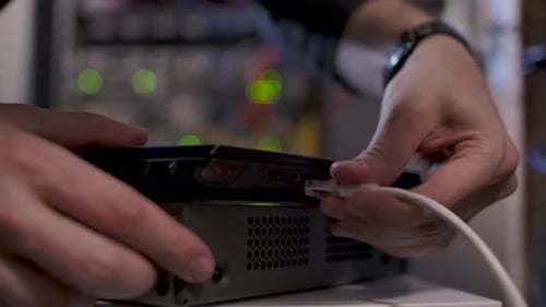 Connecting Ethernet Cable Into Laptop. close up