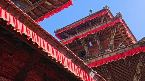 4K Slow motion of beautiful Multi-Tier Temple's rooftop and blue sky at Durbar Square, Kathmandu, Ne