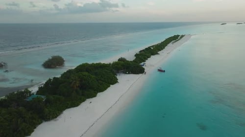 A Breathtaking Aerial View Of A Tropical Island With White Beach Sand And The Turquoise Sea