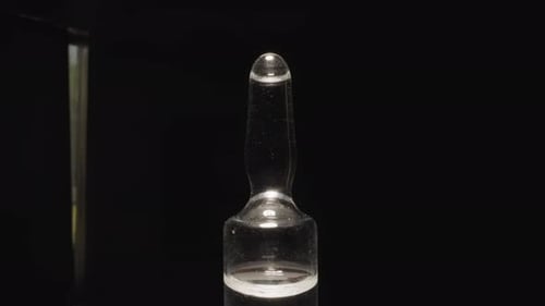 Close Up of Clear Vial with Liquid