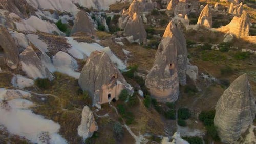 A Captivating Aerial Stock Video of the Cappadocia Region in Turkey Valleys with Houses Gracefully
