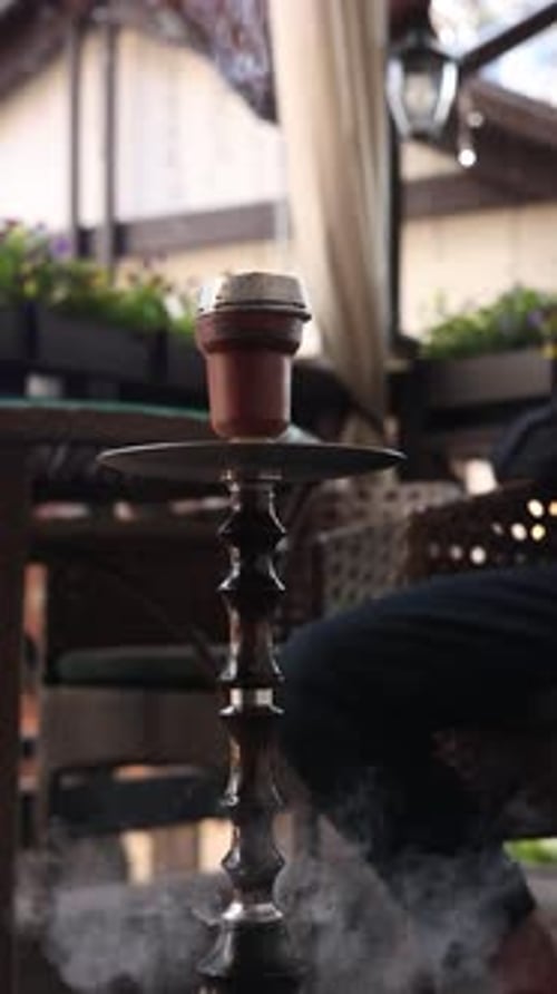 preparing a hookah at the bar