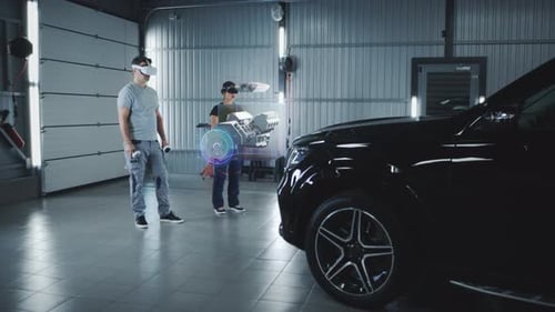 Zwei Techniker überprüfen ein Auto