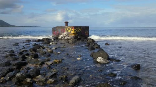 Street art by the sea Taiarapu road to Teahupoo Tahiti French Polynesia drone South Pacific Ocean up