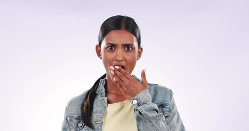 Face, surprise and woman with wow, reaction and facial expression on a white studio background