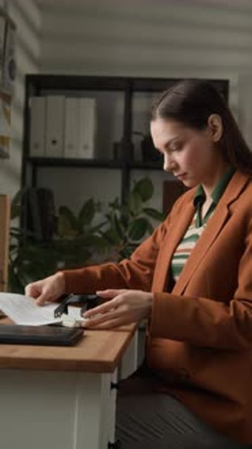 Office Administration Stapling Paper Documents