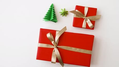Festive Red Christmas Gift Boxes with Gold Ribbons