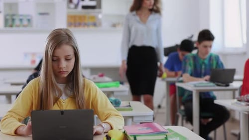 Students Actively Engaged in Various TechnologyDriven Classroom Activities for Learning