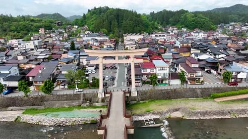 Aerial view of bridge and torii gate, Japan.