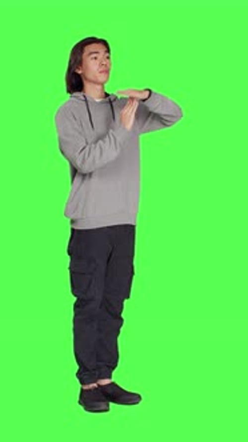 Side View of Model Does Timeout Symbol with Hands