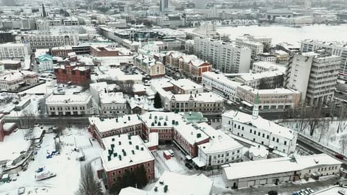 Building with Snowcovered Roofs in Winter City Centre