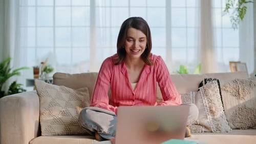 Woman on Laptop Working Remotely From Home