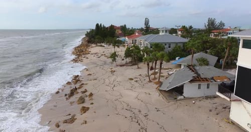 Hurricane Milton Storm Surge Destroyed House with Damaged Roof on Florida Gulf Coast Consequences of