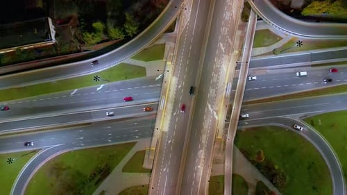 Aerial night view of empty highway and interchange Warsaw Europe after epidemic lockdown. Cityscapes