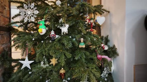 Festive Christmas Tree by Fireplace