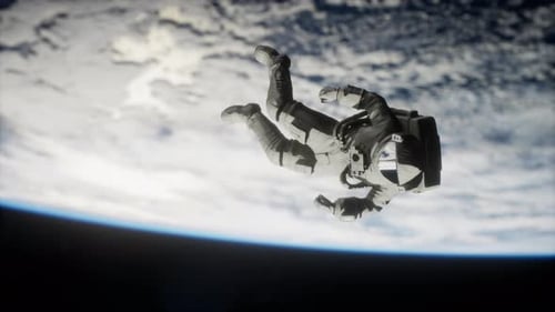 Astronaut Floating in Space Above Planet Earth