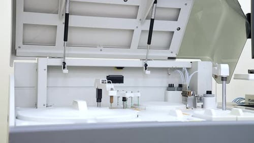 Automated Lab Equipment Testing Liquid Samples