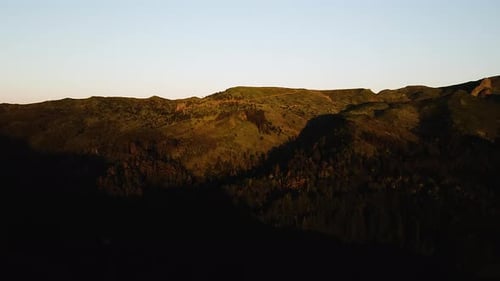 Scenic Sunset Over Mountains In Madeira, Portugal - aerial shot