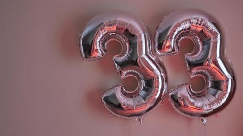 Foil Balloons Spell Out the Number Thirty Three