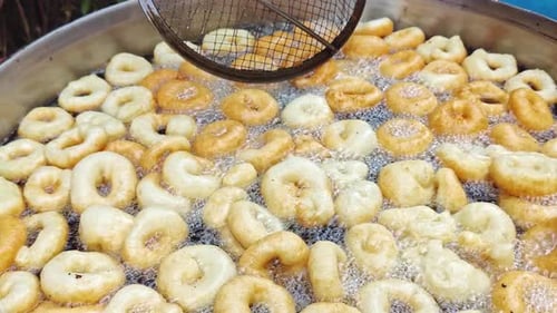 Delicious Traditional Turkish Dessert Lokma Donut Dough Cooking In Oil 15