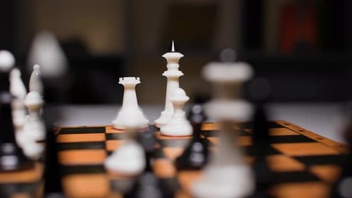 Close-up of Chess Set and Pieces on Board