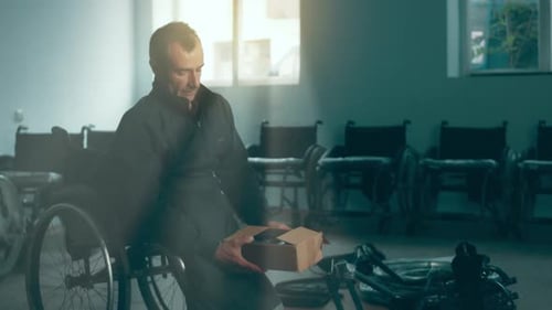 A Disabled Man Assembles a Stroller