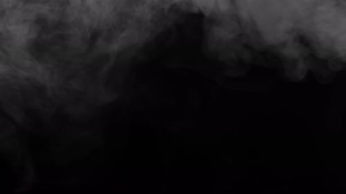 Wispy Gray Smoke Swirling on Black Background