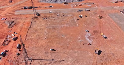Aerial View of Large Construction Site with Machinery
