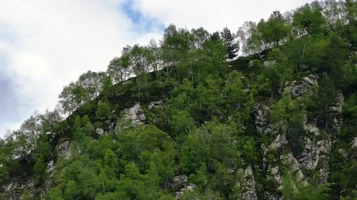 Camera Panning Up Revealing Mountain Peak