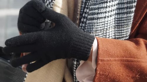 Close-Up of Gloves, Scarves, and Fashionable Coat