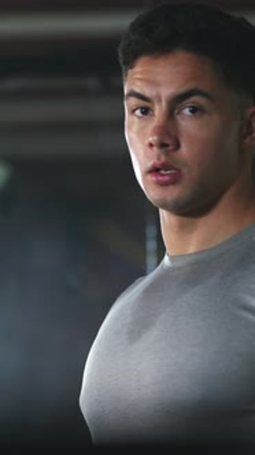 Man, face and dumbbell in gym for weightlifting, arm muscle development and strength training