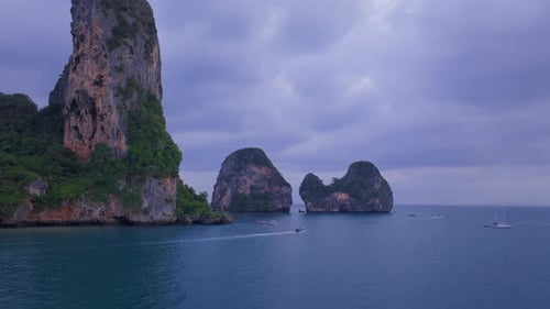 Stunning Aerial View of Krabi Thailand Captured at Night Featuring a Longtail Boat
