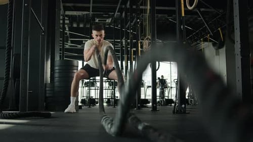 Determined Caucasian Sportsman Active Athlete Man Bodybuilder Training in Gym Muscular Guy Masculine