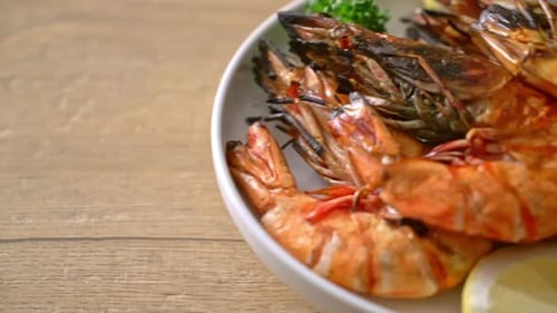 Delicious Grilled Shrimp on Plate with Lemon