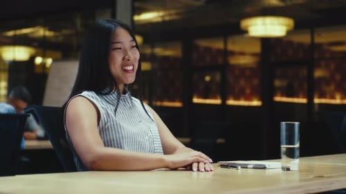 Woman Talking at Business Meeting