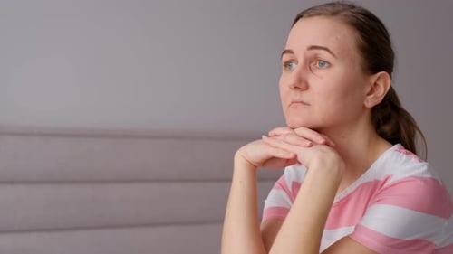 Close Up of Woman Resting Chin on Hands