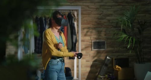 Woman Plays Virtual Reality Game in her Room