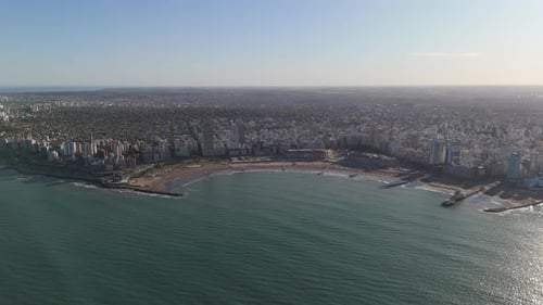 Wide aerial drone view of the port bay and resort city of Mar del Plata, Argentina.