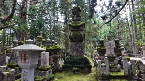 Traditional Japanese Temple Bell in Cemetery at Mount Koya During Autumn