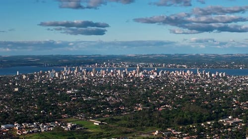 A mesmerizing aerial view of Posadas city with the majestic Paraguay River and Paraguay in the backg