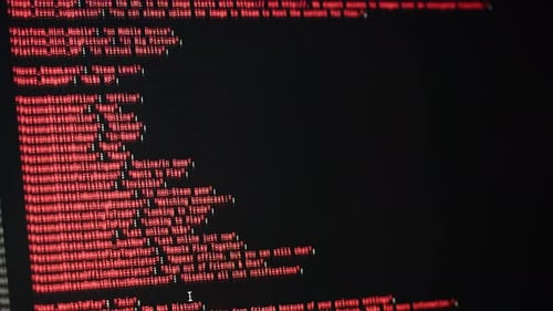 Programmer Using Laptop Program Code and Script Data on the Screen Closeup Hacker Attack