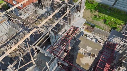 Aerial Video of Apartment Towers Undergoing Metal Work
