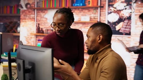 IT Coworkers Programming in AI Startup Office